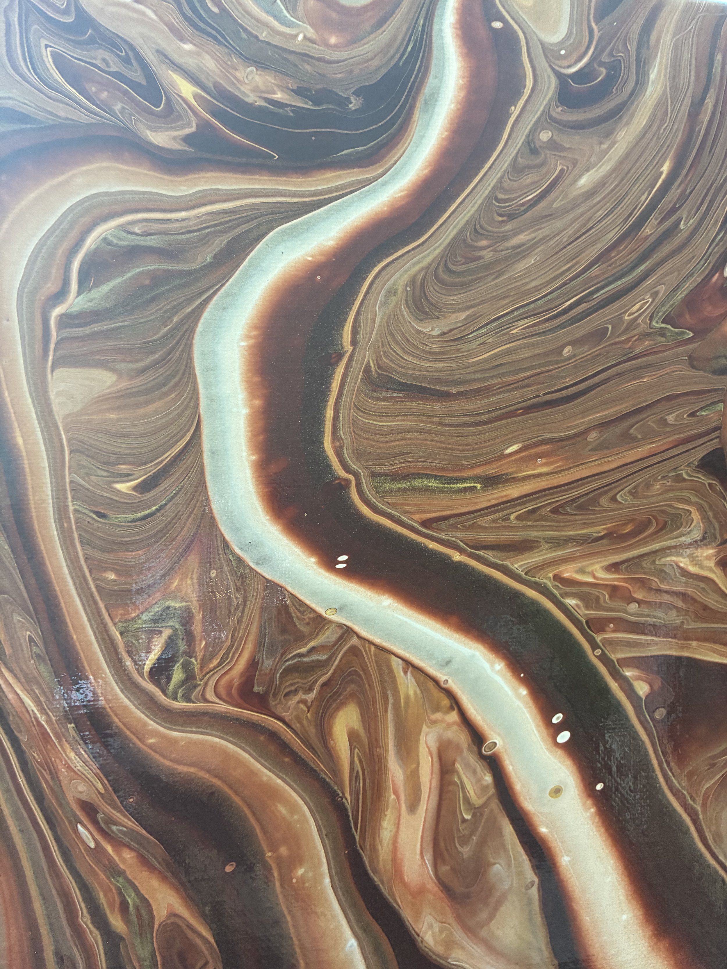 Intricate layers of bronze, copper, and stone-inspired tones reveal the depth, movement, and natural beauty at the heart of Whispered Canyon.