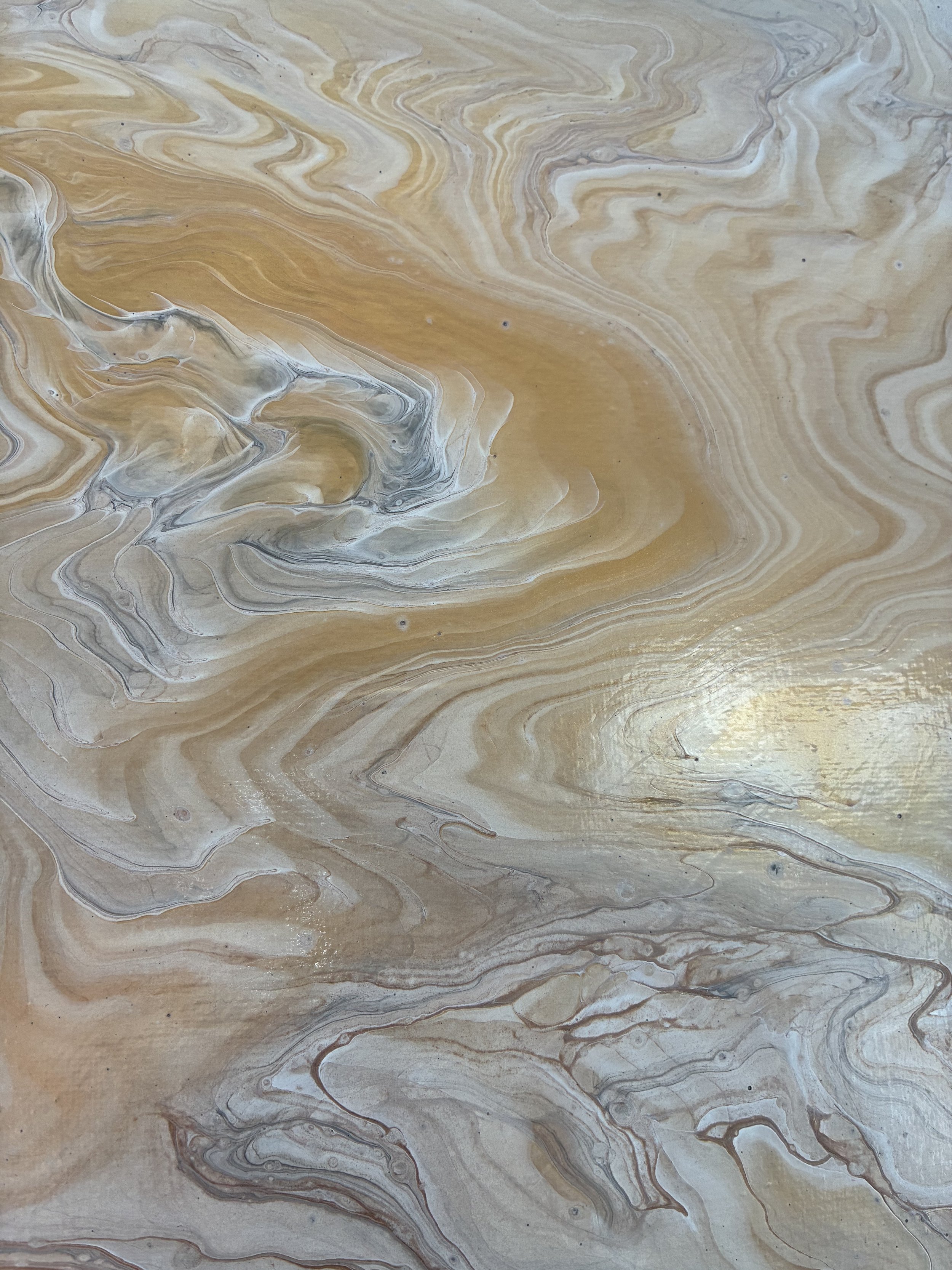 Echoed Stone from the Stone Whisper Collection — layered marbling, soft metallic warmth, and fluid stone-inspired movement.