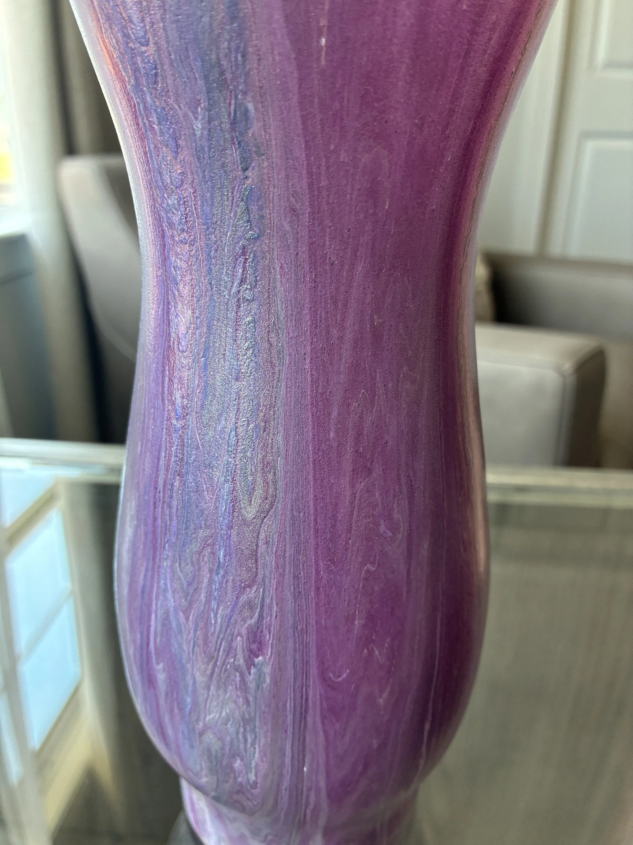 A close-up of Velvet Current's flowing surface, showcasing rich violet, lavender, and pearl tones with delicate movement and luminous depth. 
