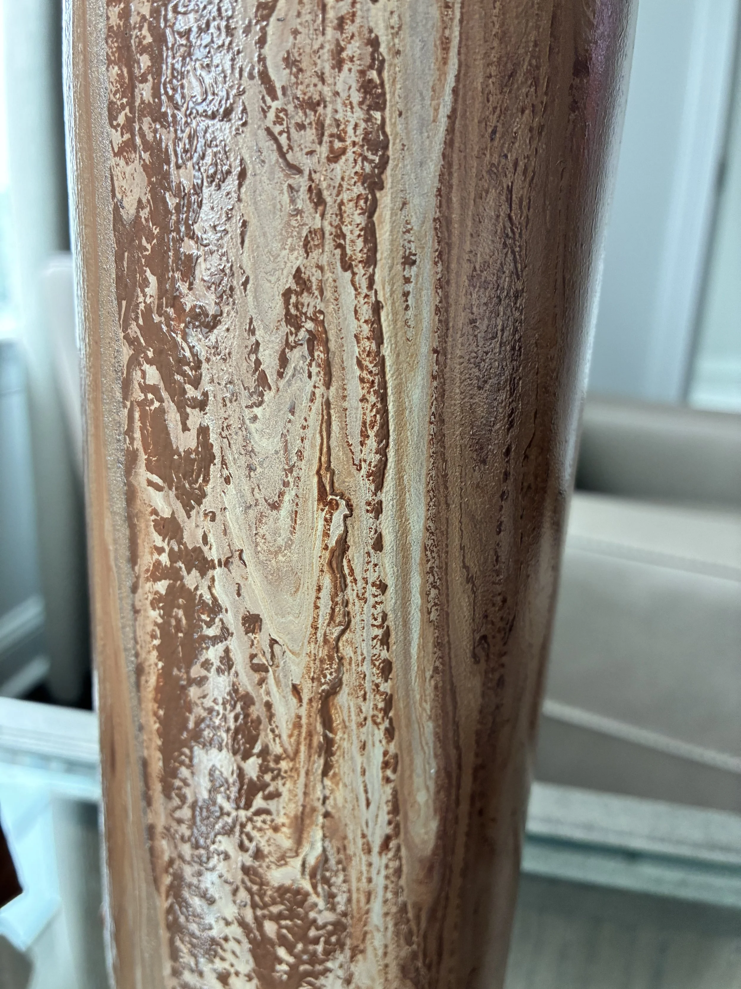 Burnished texture and flowing metallic detail from the Velvet Ember collection.