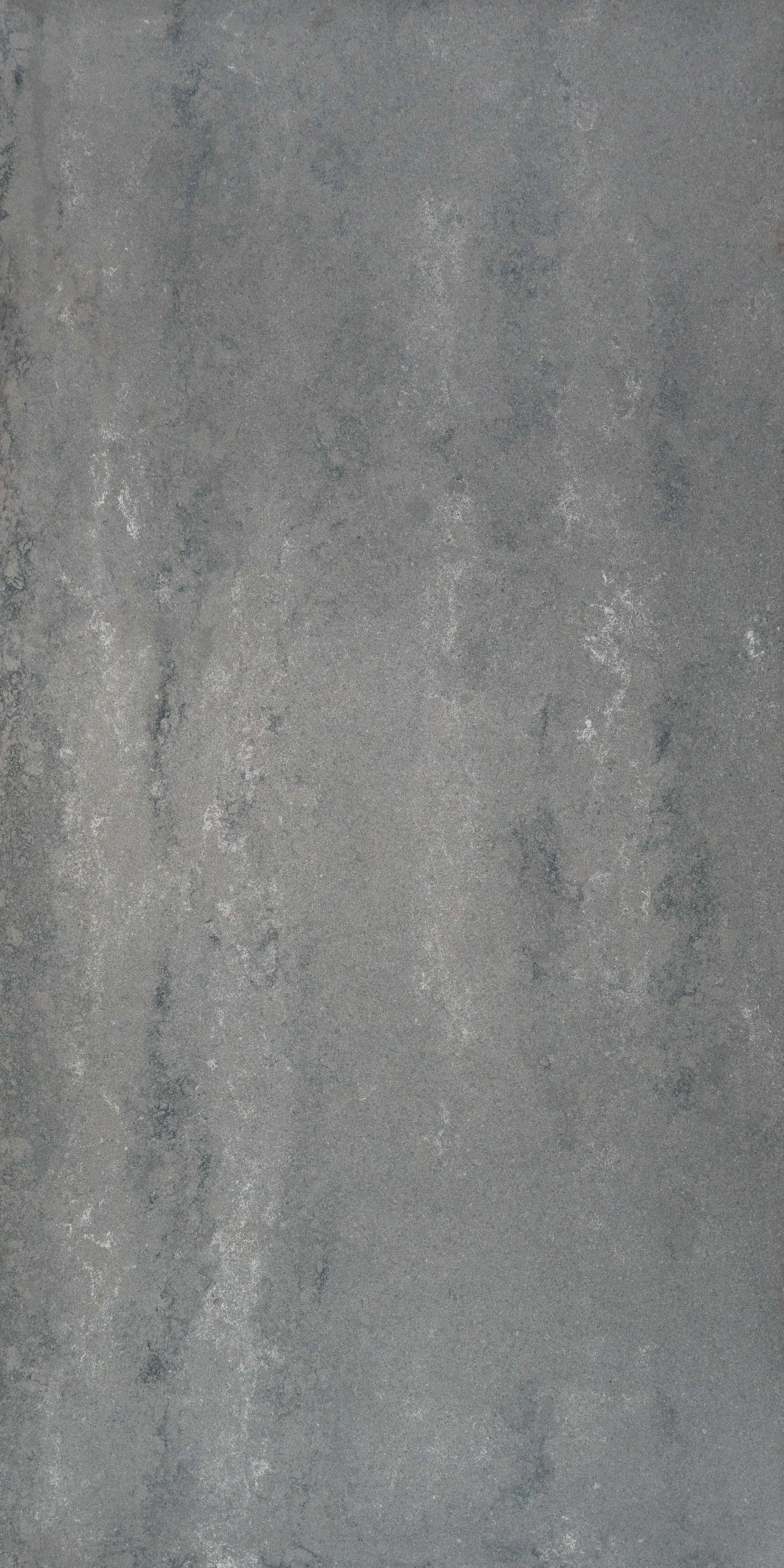 Close-up of a textured gray concrete surface.
