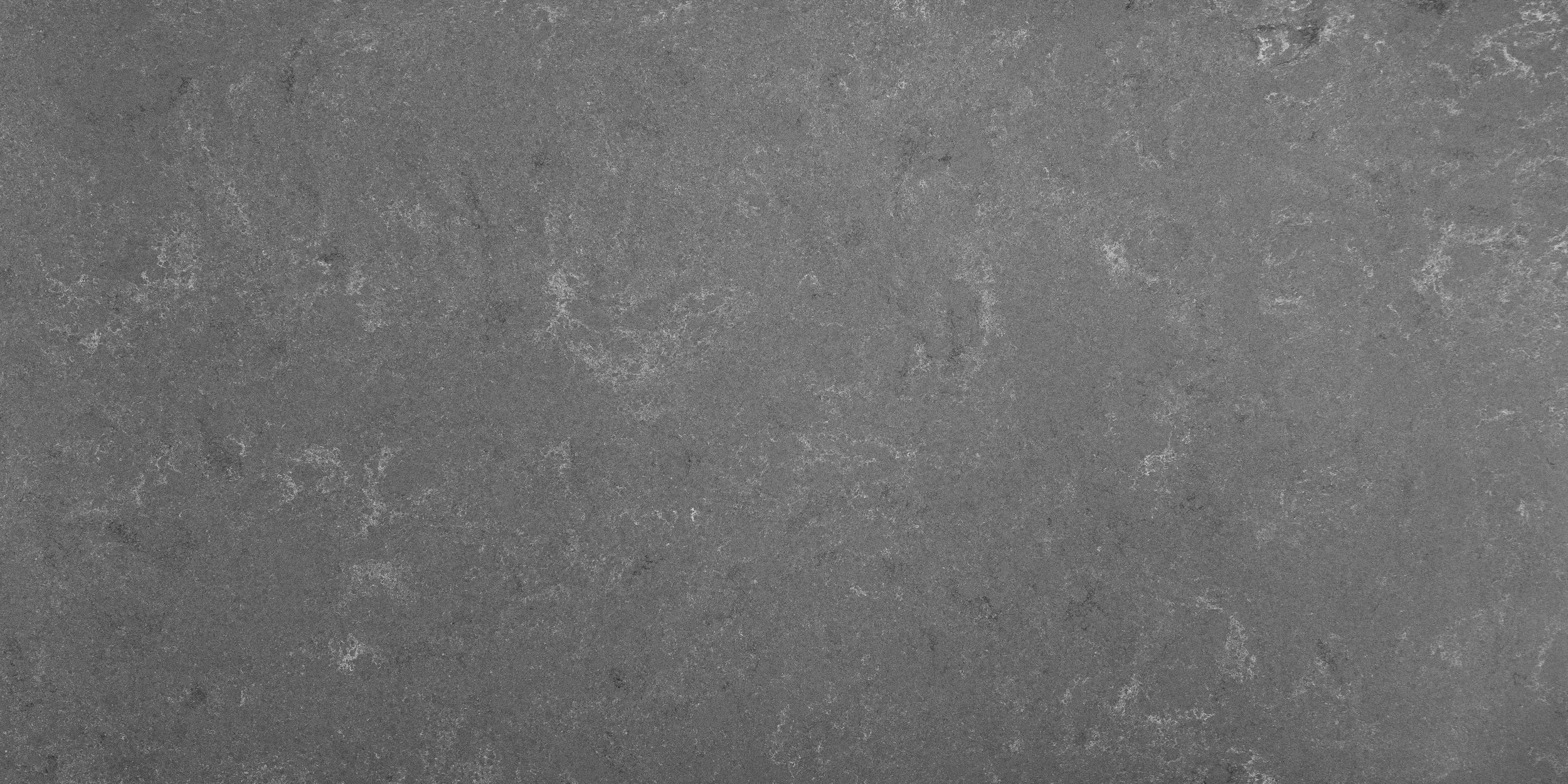 A textured gray concrete surface.