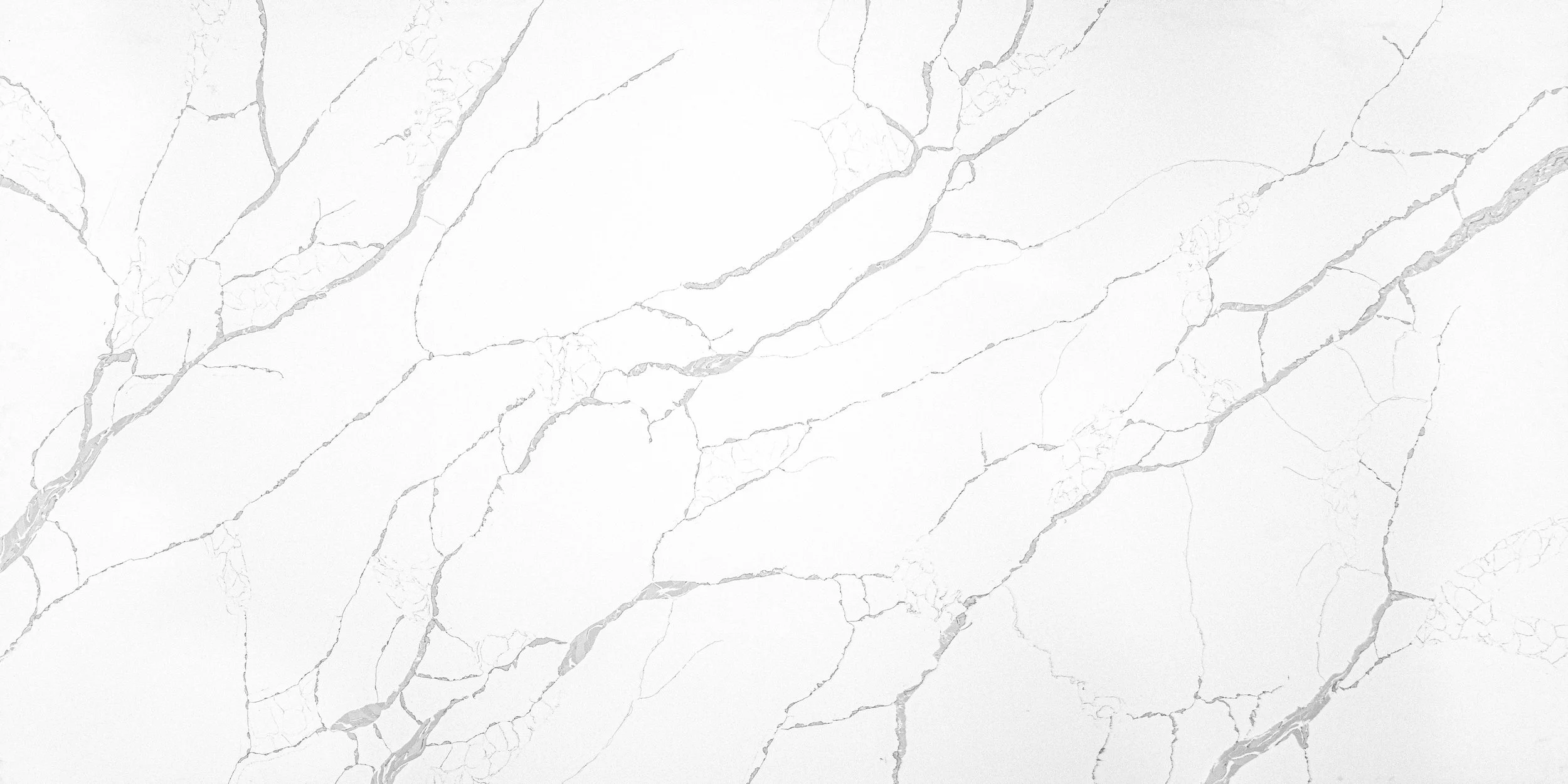 White marble surface with gray veining.
