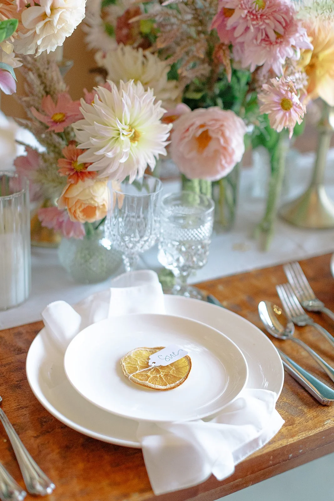 pretty florals with orange place cards.jpg