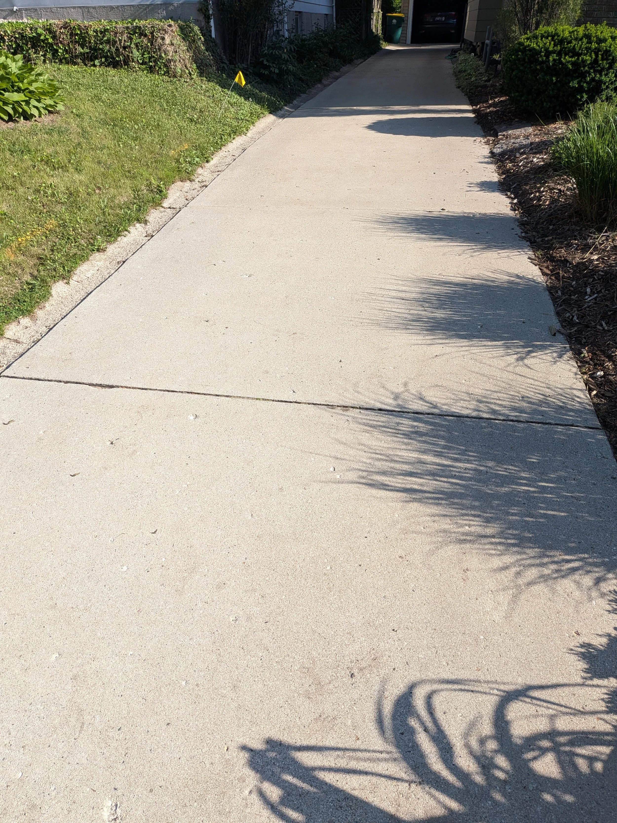 The Driveway Refresh: Cleaning & Sealing Service
