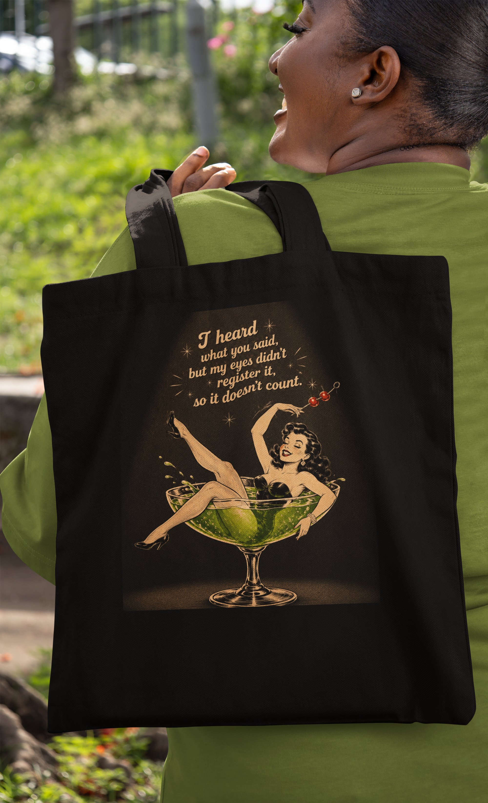 mockup-featuring-a-cheerful-woman-carrying-a-tote-bag-on-her-back-m56950.png