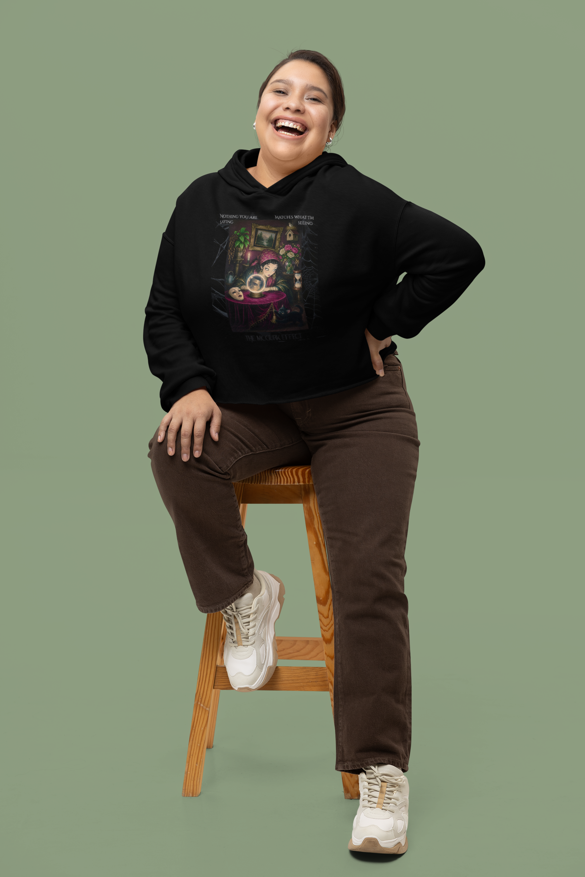 bella-canvas-cropped-hoodie-mockup-featuring-a-cheerful-woman-sitting-on-a-stool-m34562.png