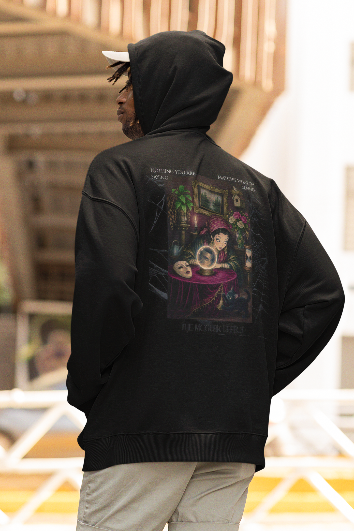 back-view-hoodie-mockup-featuring-a-man-walking-on-the-street-m25250.png