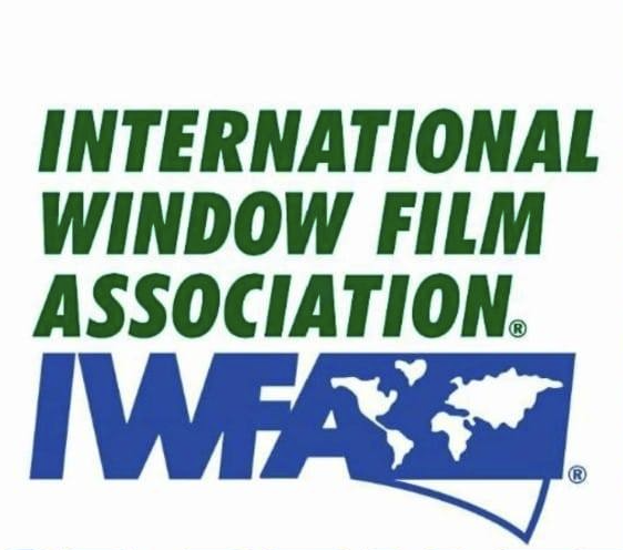 Logo of the International Window Film Association with green text and a blue world map and border.