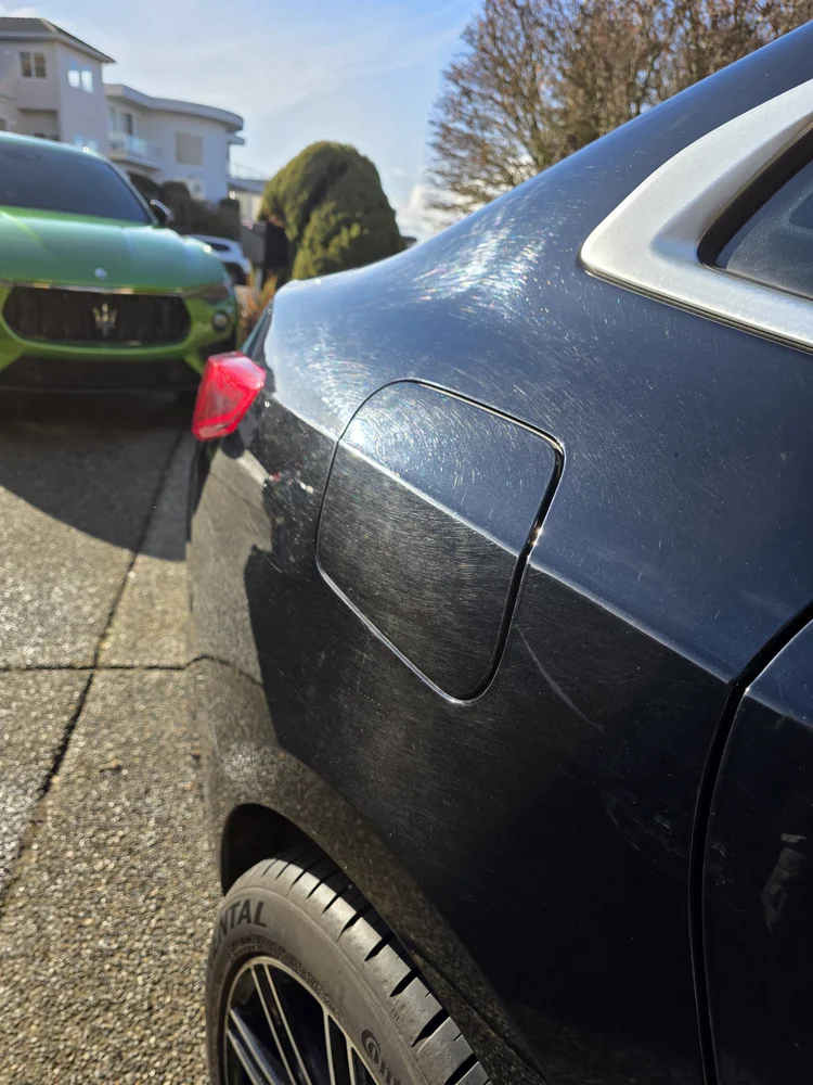 Paint before correction — heavy swirl marks visible