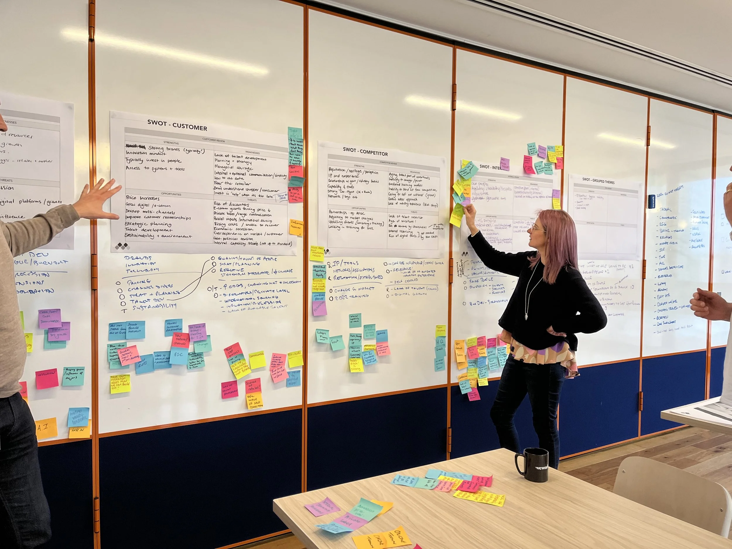 Client and consultant reviewing commercial performance together