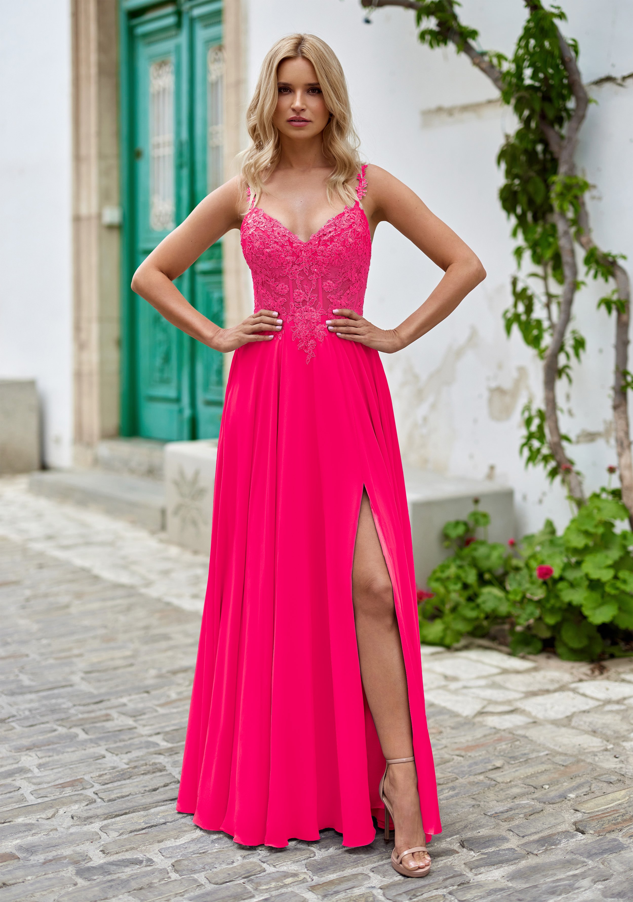 flowing-evening-dress-with-rhinestone-applications-in-shocking-pink.jpg