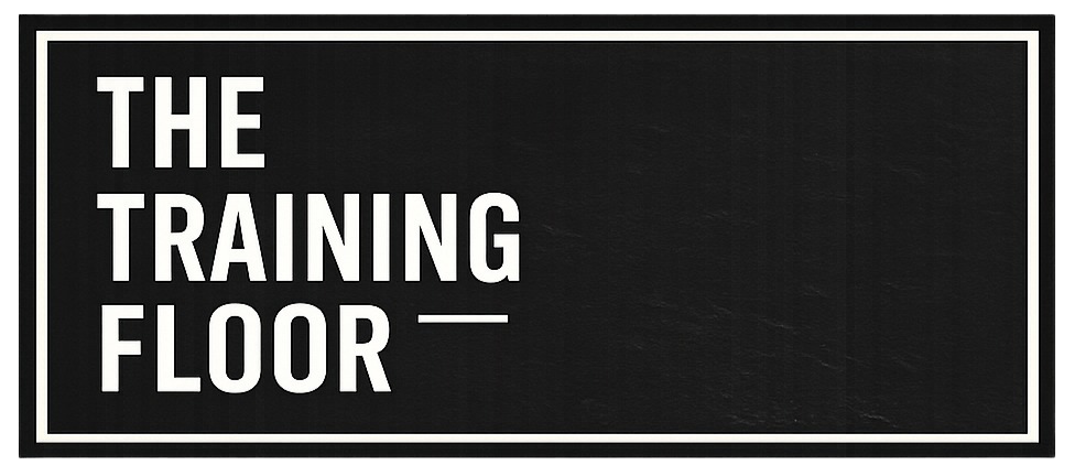 Sign with white text on black background reading 'The Training Floor'