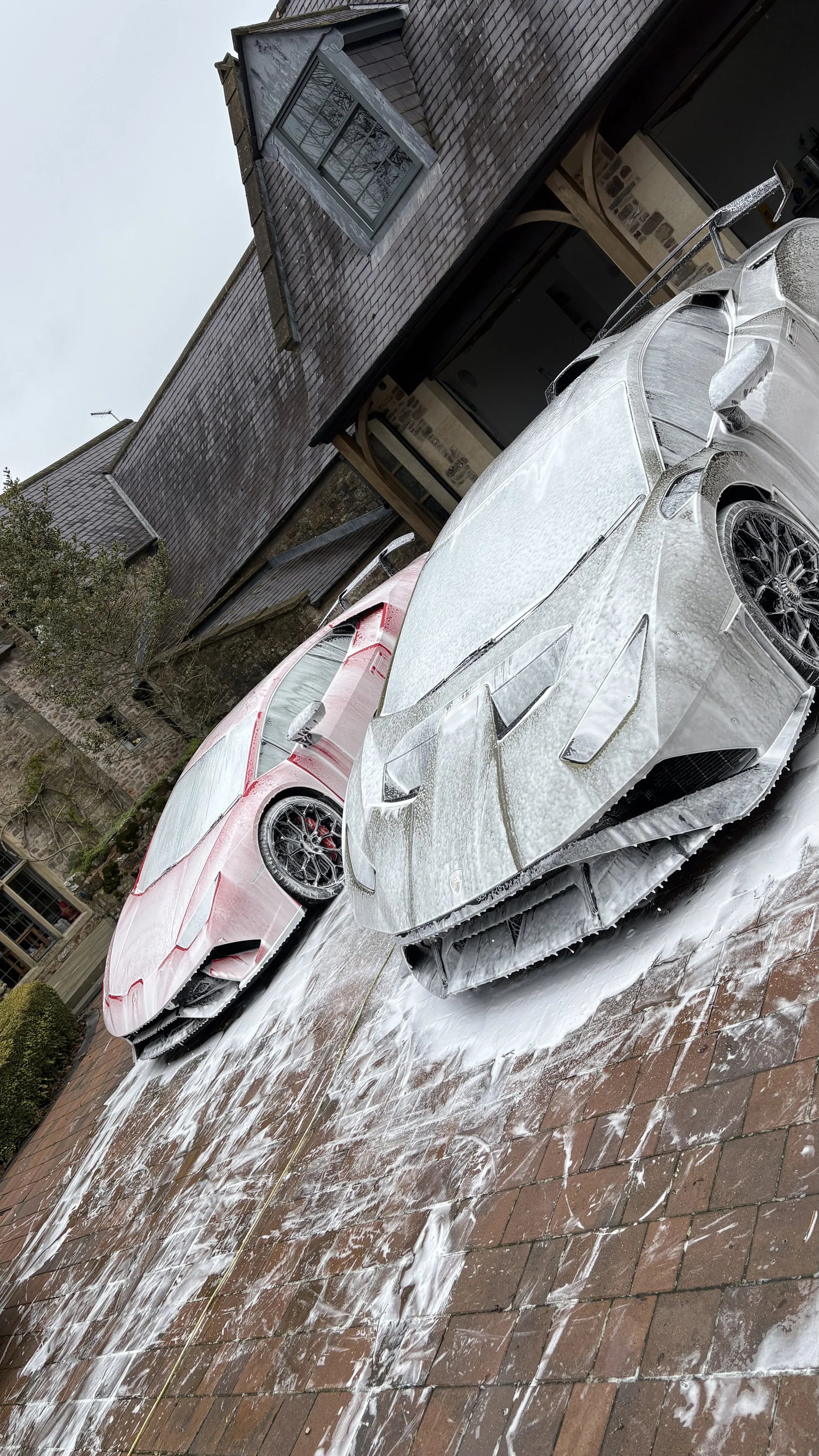 Luxury Lamborghini valeting and snow foam pre-wash service by Evolution Valets in Bristol for high-end vehicle detailing and paint protection