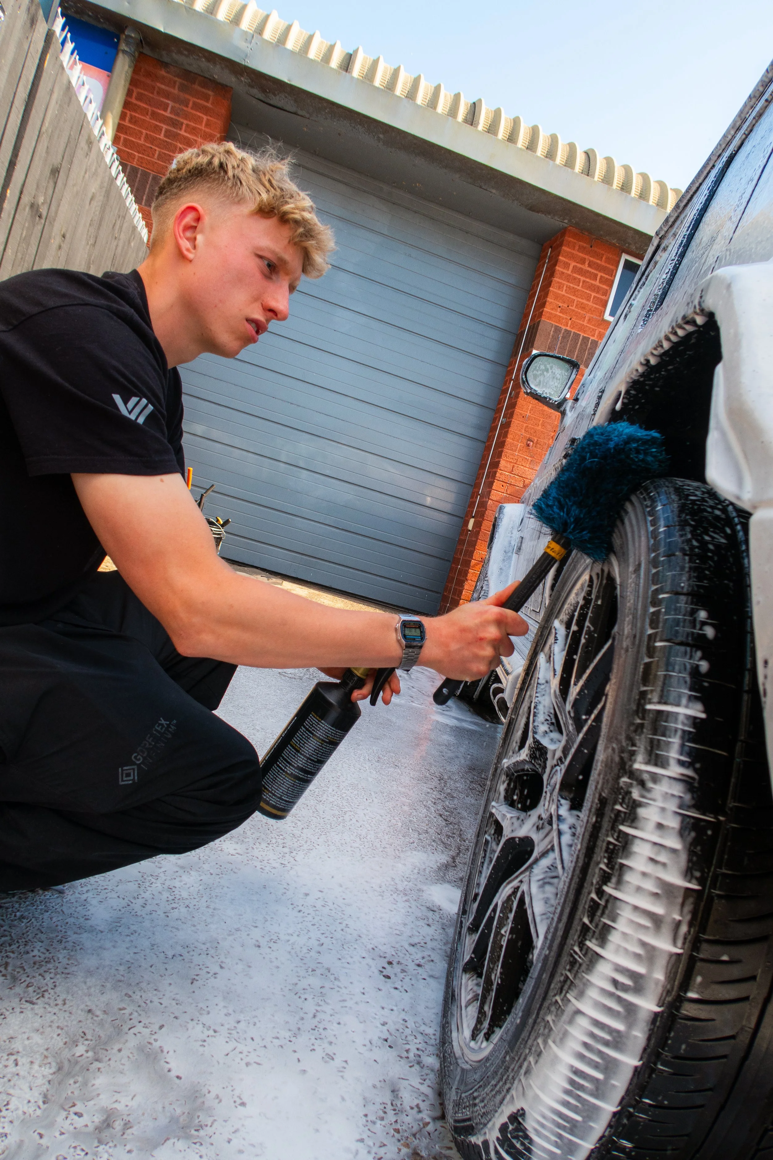 Professional wheel cleaning and exterior valeting service by Evolution Valets in Bristol using safe detailing techniques on a luxury vehicle