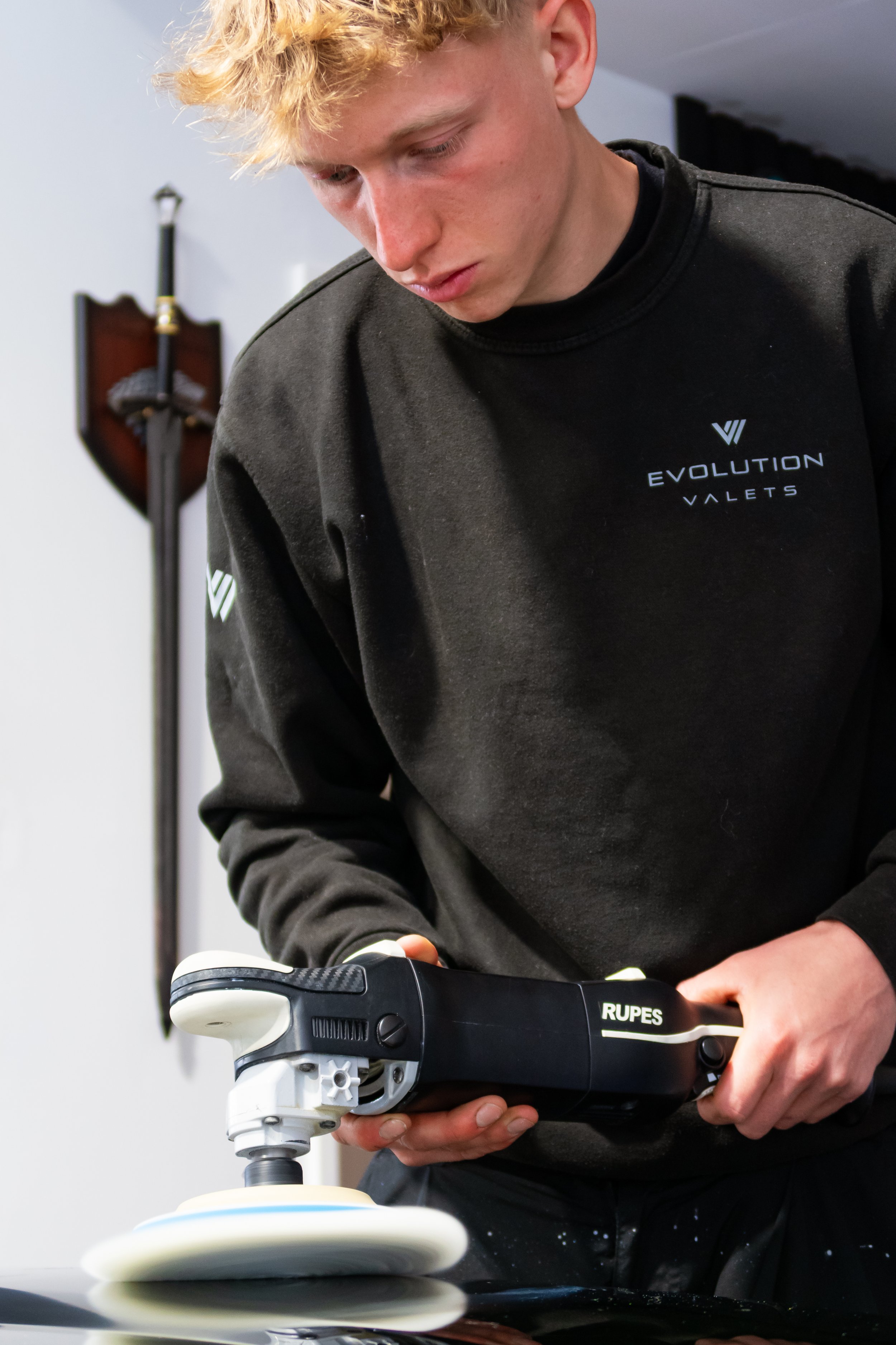 Professional paint correction and machine polishing service by Evolution Valets in Bristol using specialist detailing equipment to restore vehicle paintwork