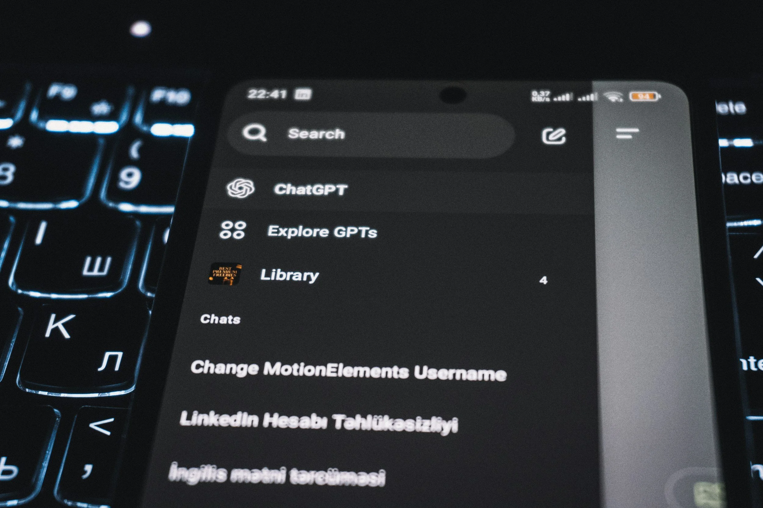 A smartphone screen displaying a messaging app menu, with options including ChatGPT, Explore GPTs, Library, Chats, Change Motion Elements, and LinkedIn account settings. The time is 22:41, and the device shows a Wi-Fi signal, cell signal, and battery icons.