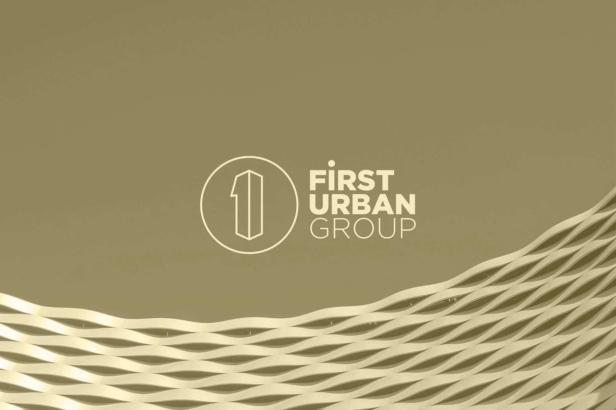 Logo of First Urban Group on a gold background with a decorative woven pattern at the bottom.
