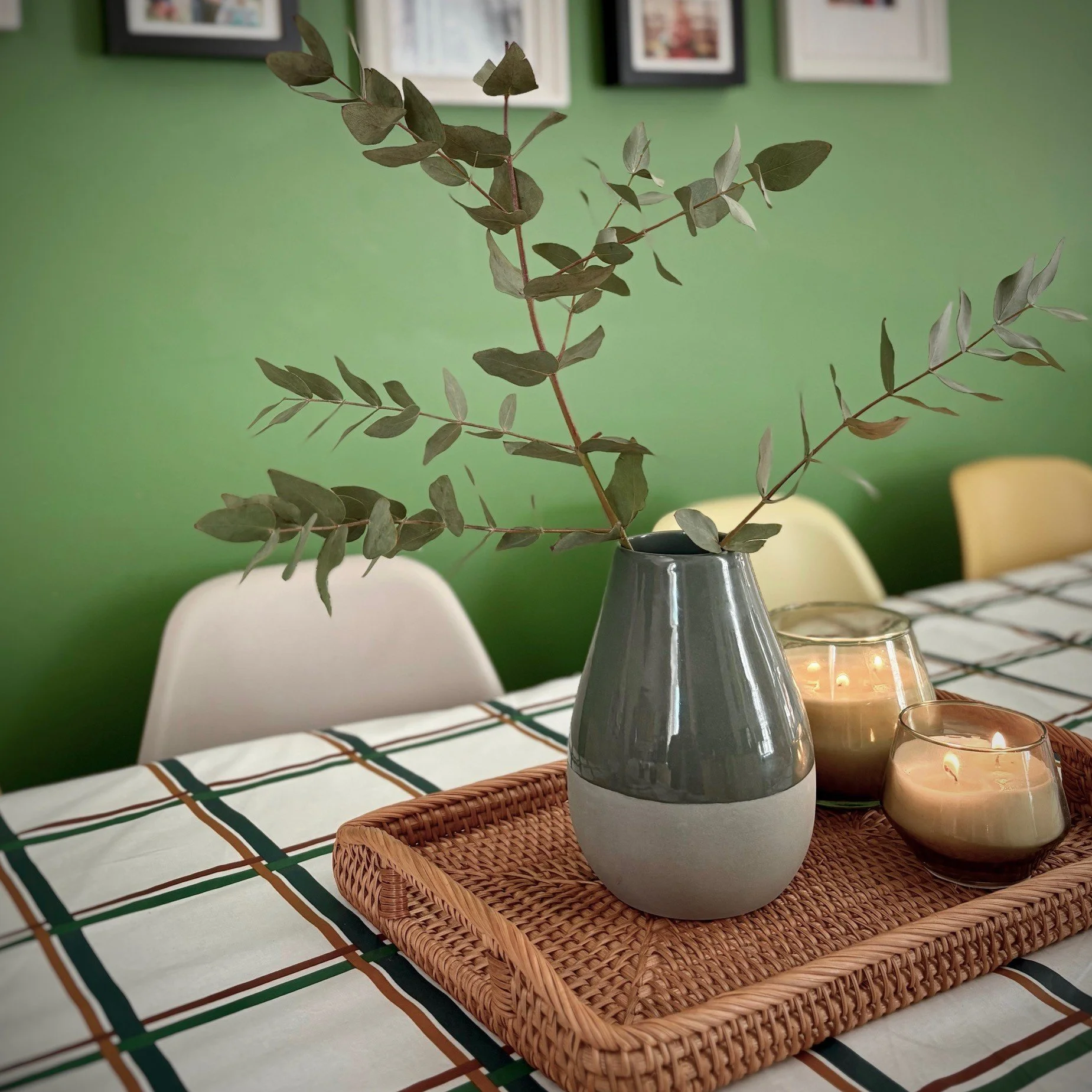 Atmospheric kitchen table styling combining contemporary and heritage influences with natural textures and muted, earthy tones