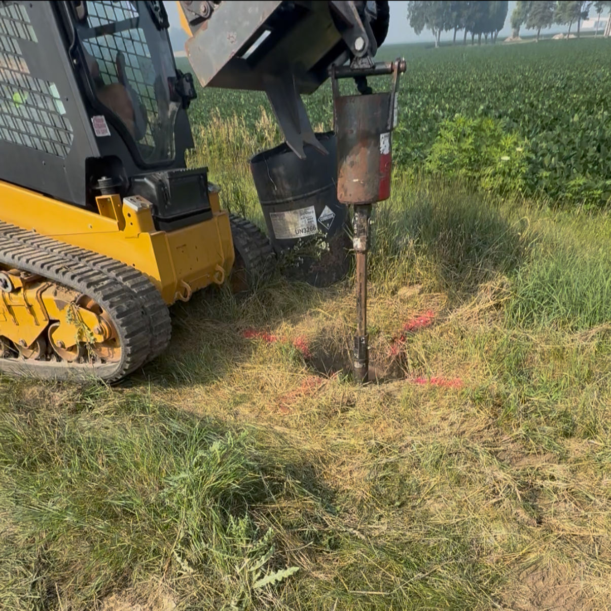 Fox lake, Wisconsin.  Auger drilling for Pole barn addition.