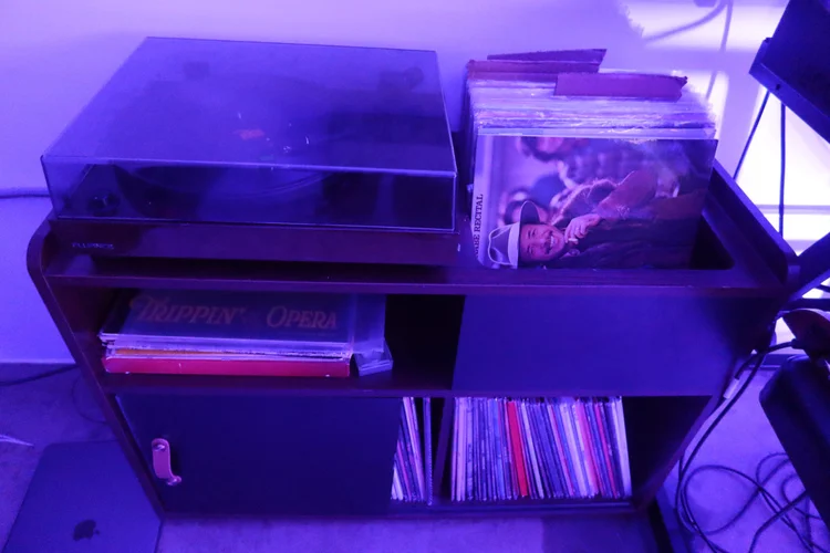 Turntable and vinyl collection at Blndman Records