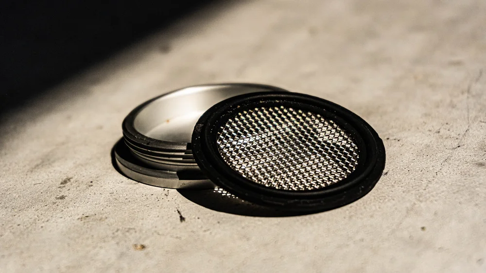 The 150 micron screen and kief catcher of the grinder