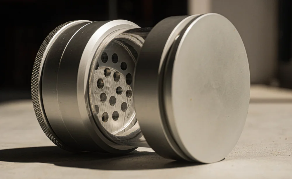 The Othello Twist grinder opened up on a table