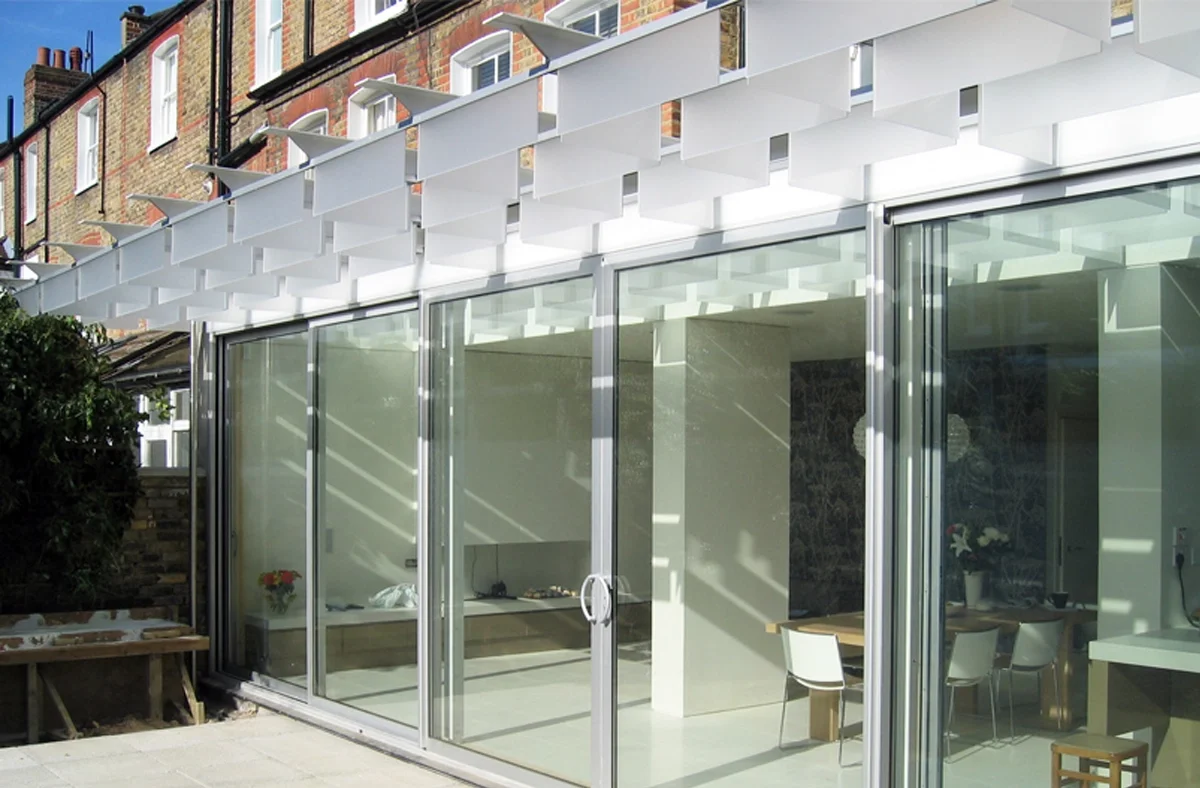 Levitate's wandsworth house close-up of the integrated rear glass fins which connect home to garden and modulate natural light.