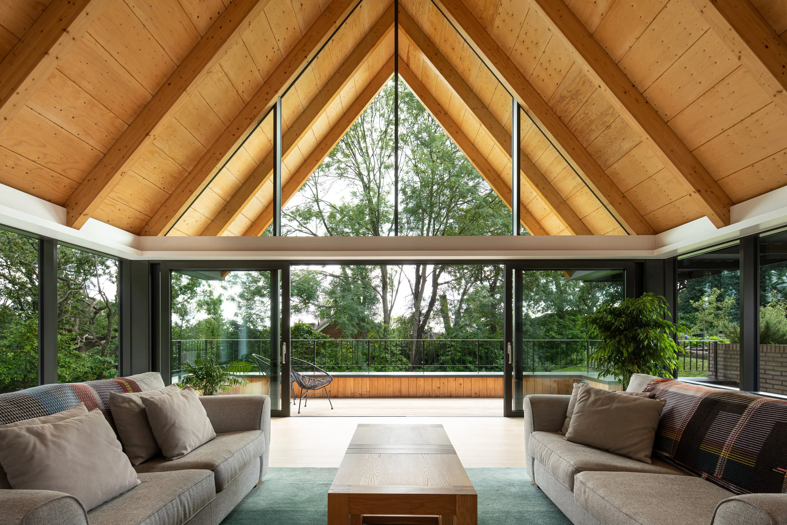 Levitate Architects — Highoak's dramatic Arts and Crafts inspired modern home utilises warm and light materials to form spacious living as seen in this living space overloo
