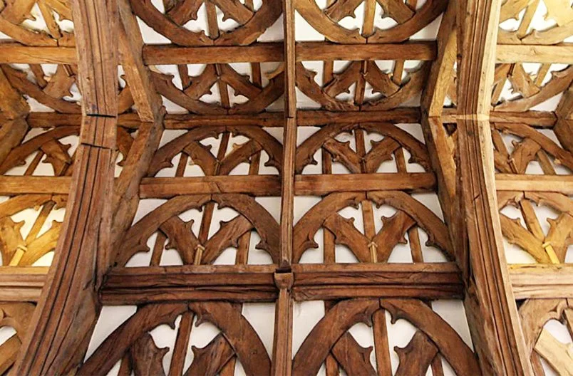 Levitate Architects' Whitestaunton manor interior details the craftsmanship of restored medieval timber roof trusses in the main hall