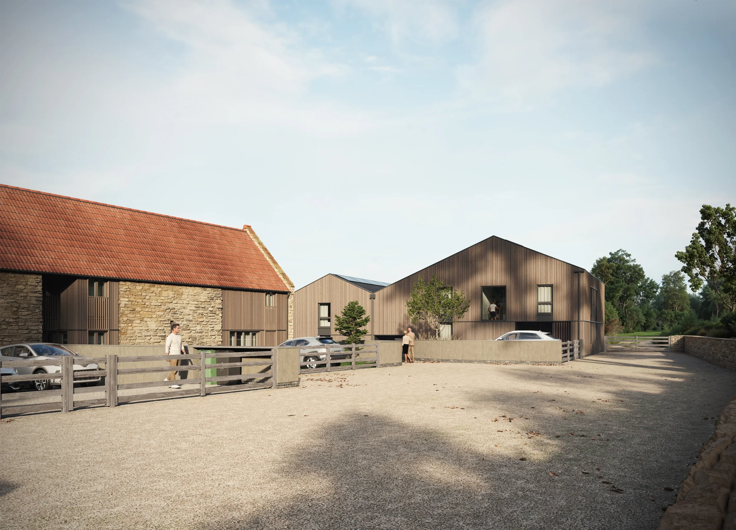 Levitate's Newton Farm Barns central courtyard view showing the restored Grade II listed stone barn paired with modern vertical timber cladding