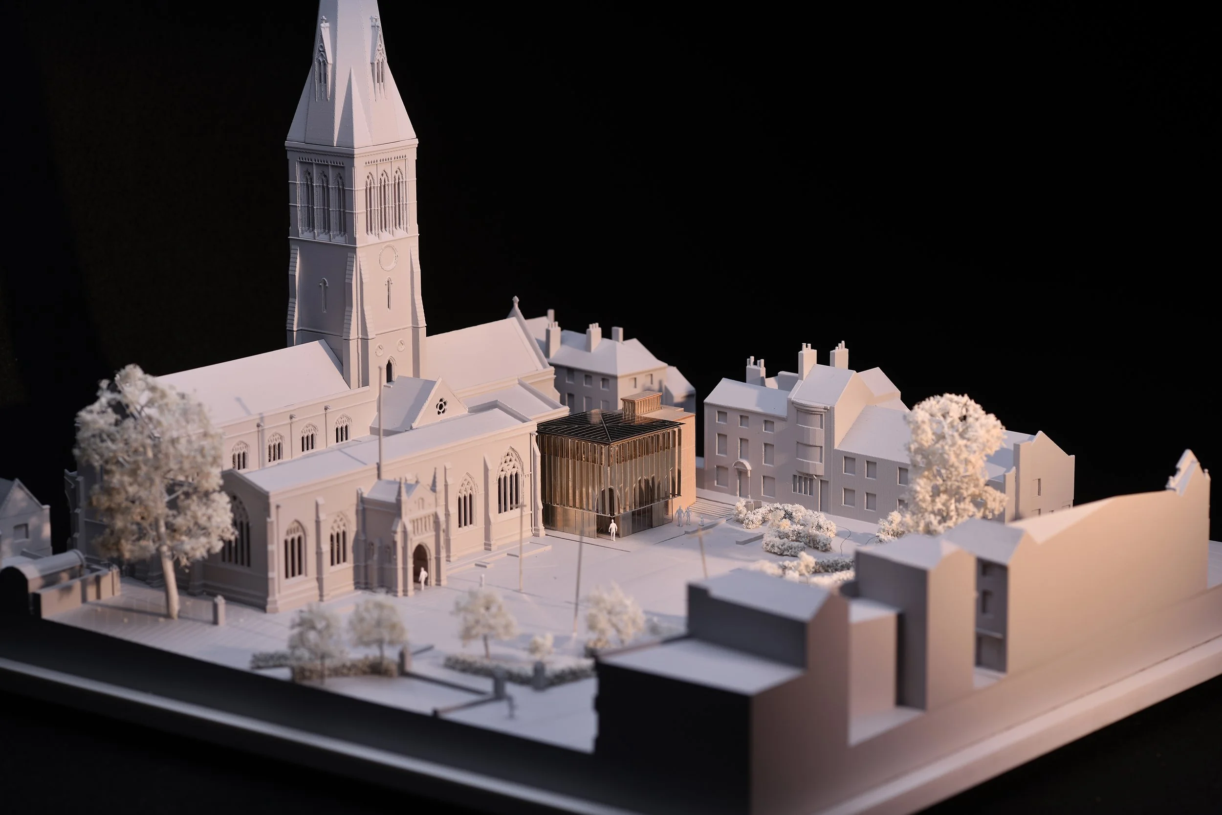 Levitate Architects' Leicester Cathdral scale model reveals a modern respectful extension integrated smoothly into the historic site courtyard