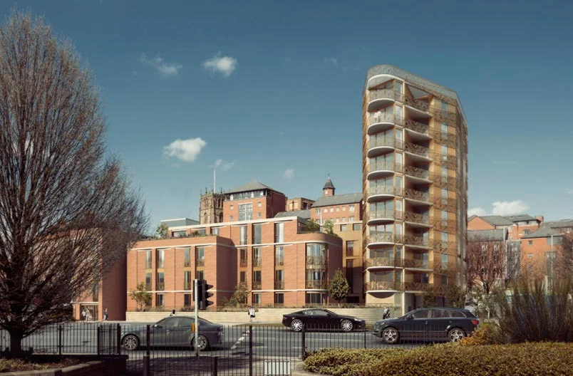 Levitate's Lace Building daytime street view displaying the brick and sandstone lower volume alongside the taller lattice-wrapped tower