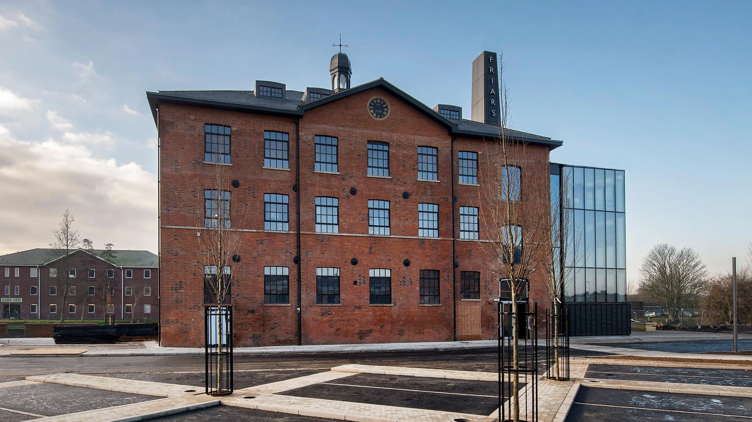 Levitate Architects — Friars Mill saw Levitate conserve and reconstruct a fire damaged mill, recreating its historic roof form, brick repairs and new glazing as well as a n