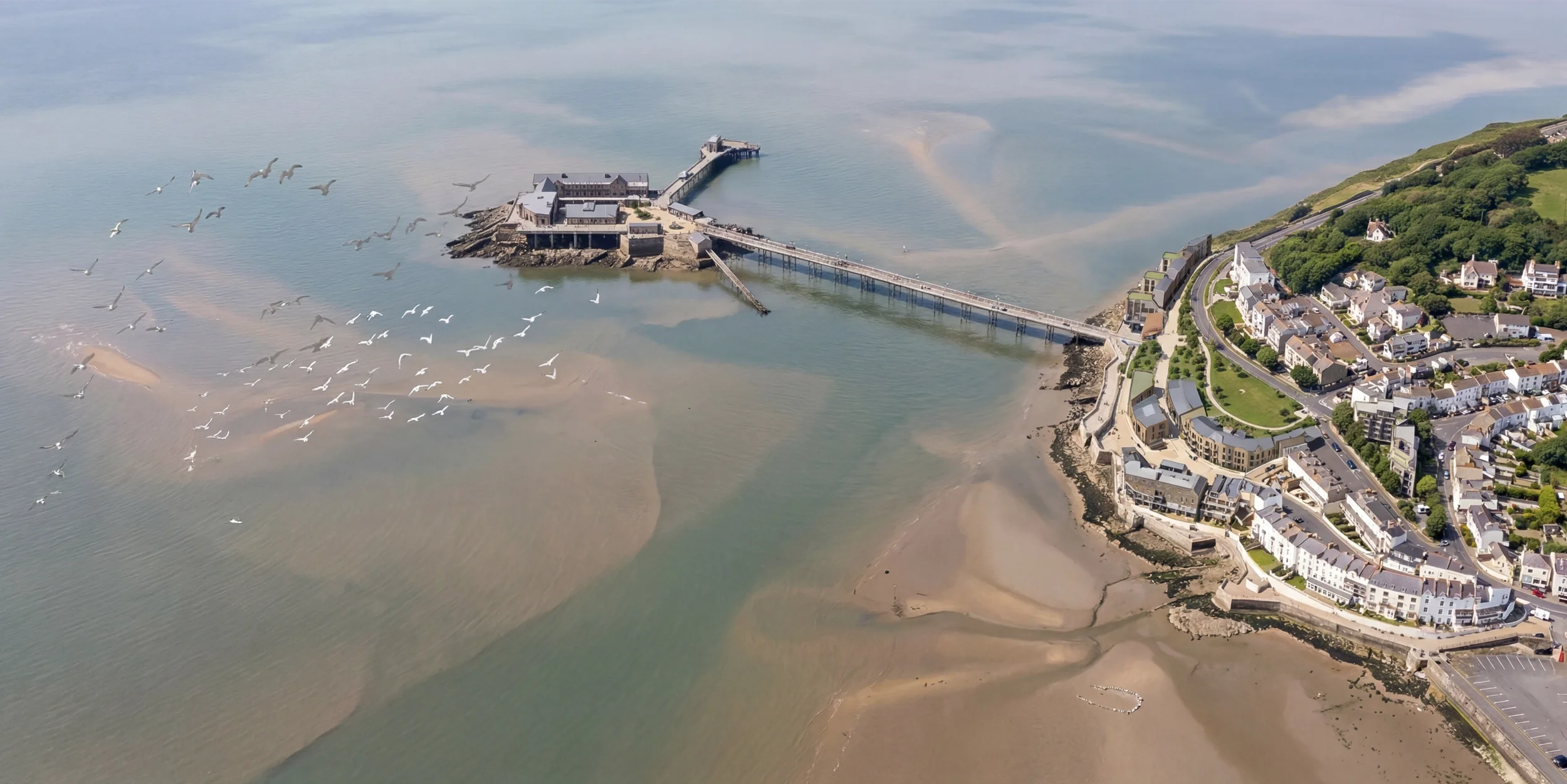 Levitate's Birnbeck pier aerial render of the completed regeneration, blending new buildings with the restored Grade II Listed heritage island.