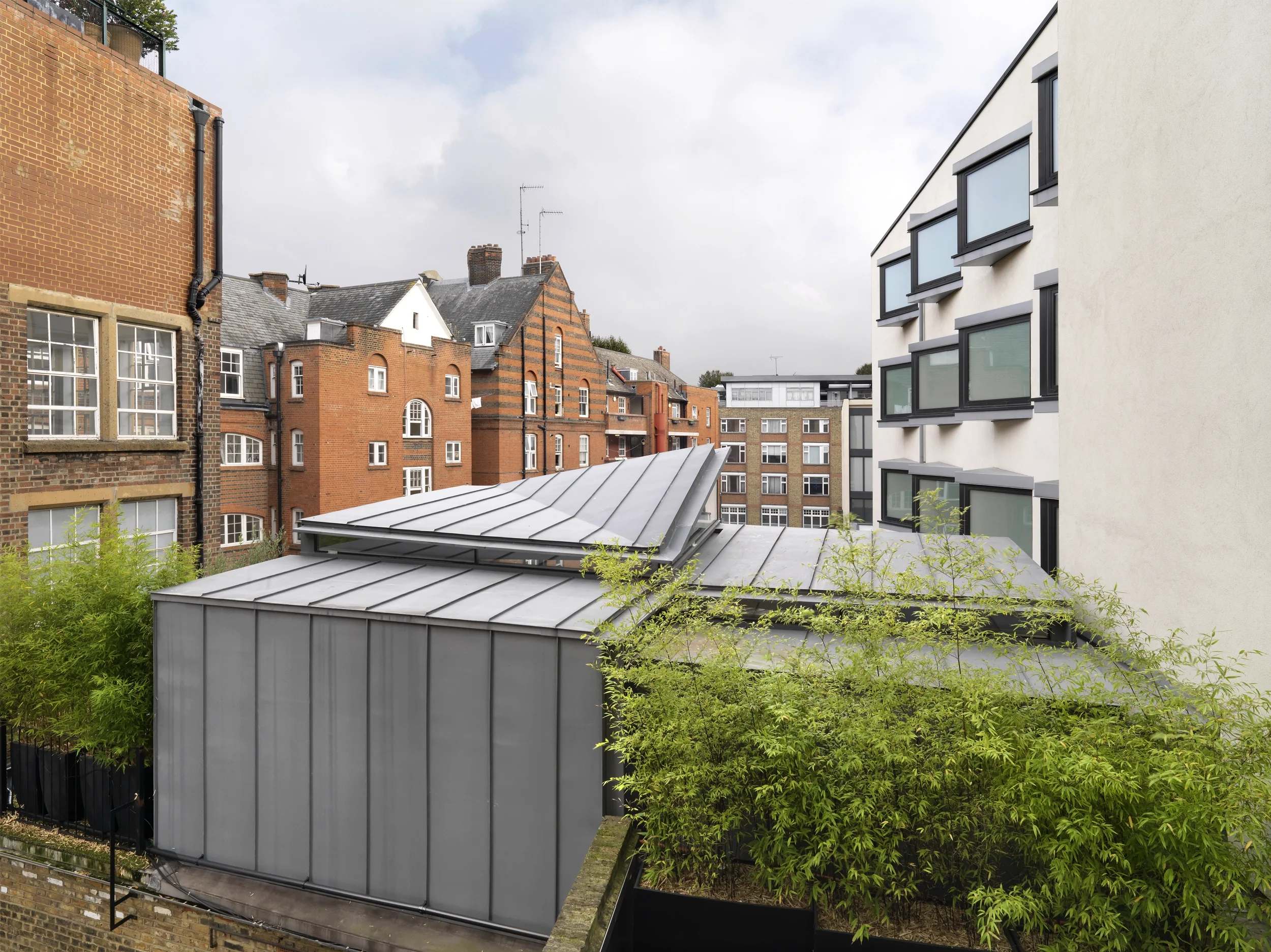 Levitate's Shoreditch Loft kitchen dining space standing seam metal clad external elevation