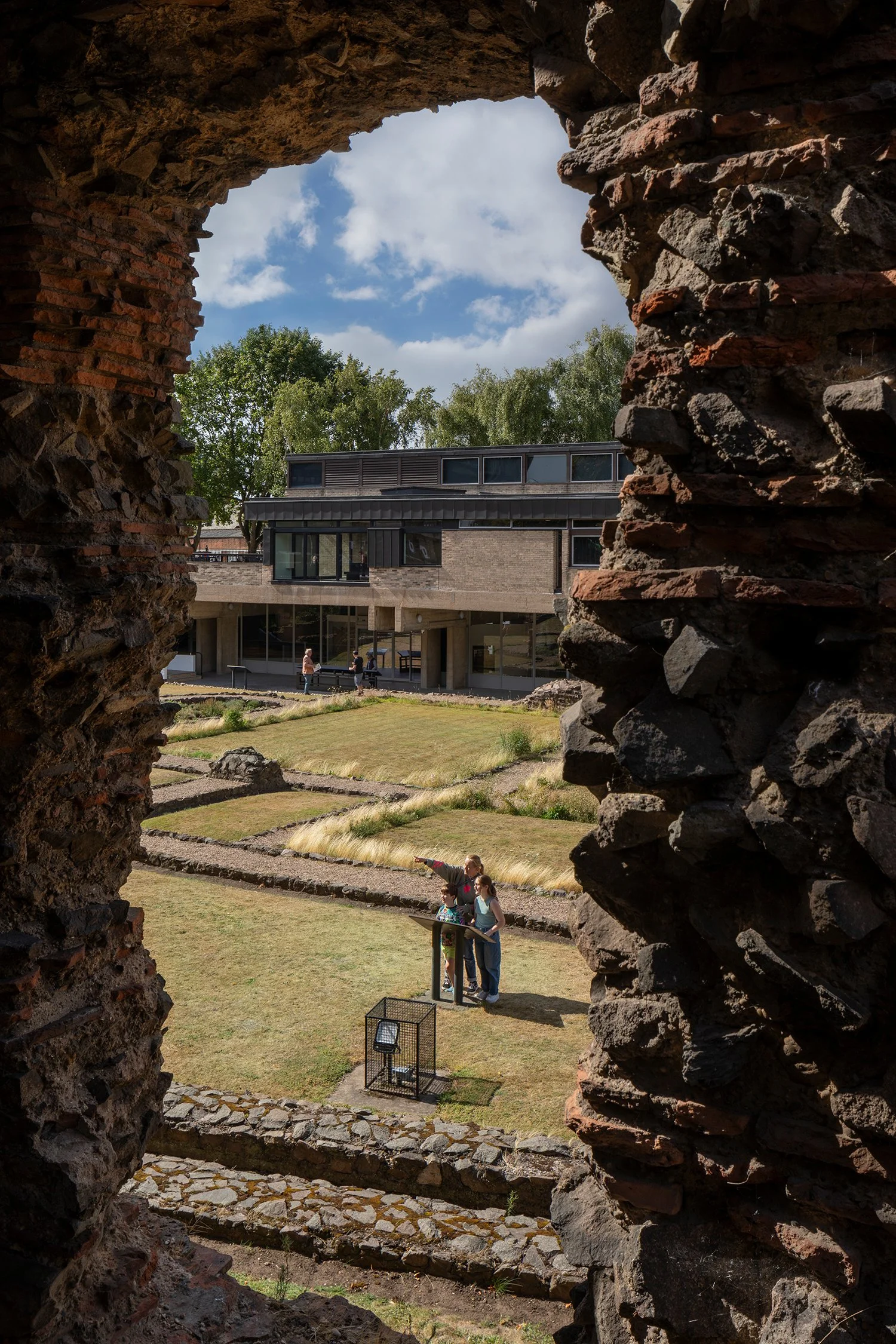 Jewry Wall Museum new entrance lobby and conservation by Levitate Architects adapts Trevor Dannatt’s museum building, viewed across the ancient Roman ruins.
