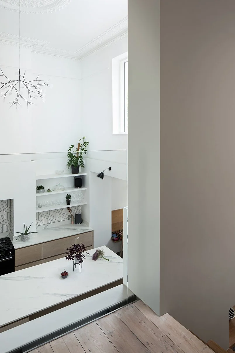 Levitate Architects Gloucester Drive modern kitchen renovation viewed from above, combining period detailing with a contemporary extension and marble island.