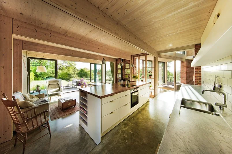 Bespoke mid-century modern interior architecture inside PATCH by Levitate, showcasing open-plan layouts, natural light, and passive sustainability features.