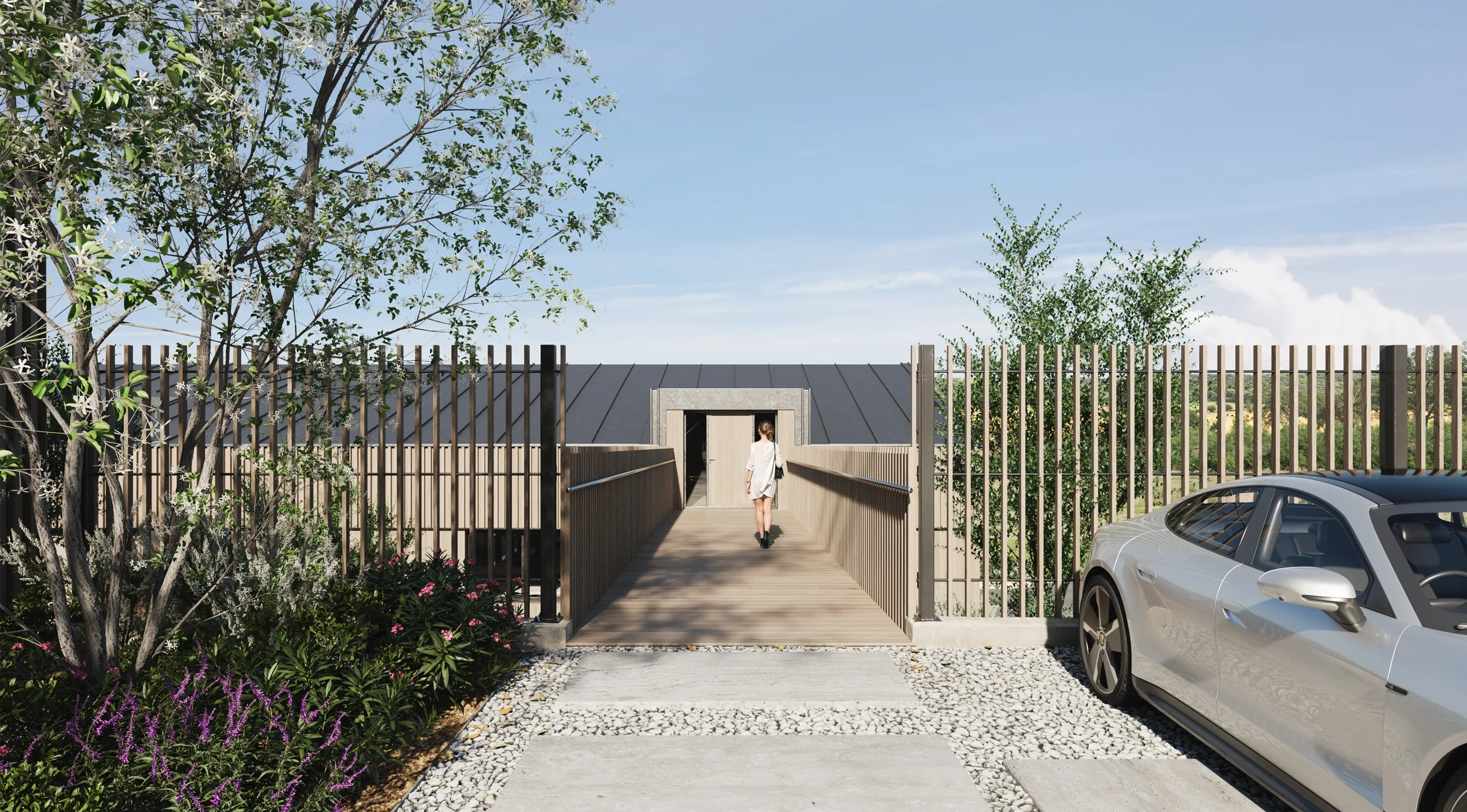 Levitate's new build home Compton Bassett shows a timber walkway leading to the entrance of a sustainable, modern property.