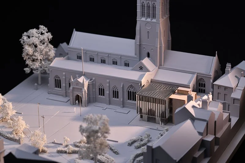 Levitate Architects' Leicester Cathdral model close-up shows a modern respectful extension nestled directly against the historic site stone walls