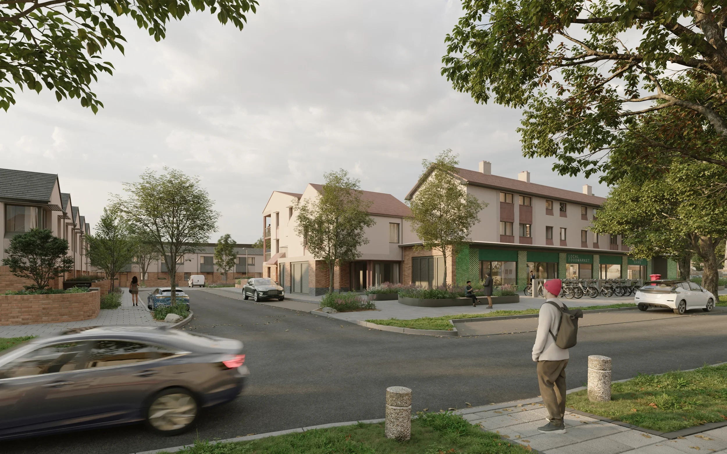 Levitate Architects Stocking Farm neighbourhood centre street view showing local community retail hub and energy-efficient Passivhaus homes.