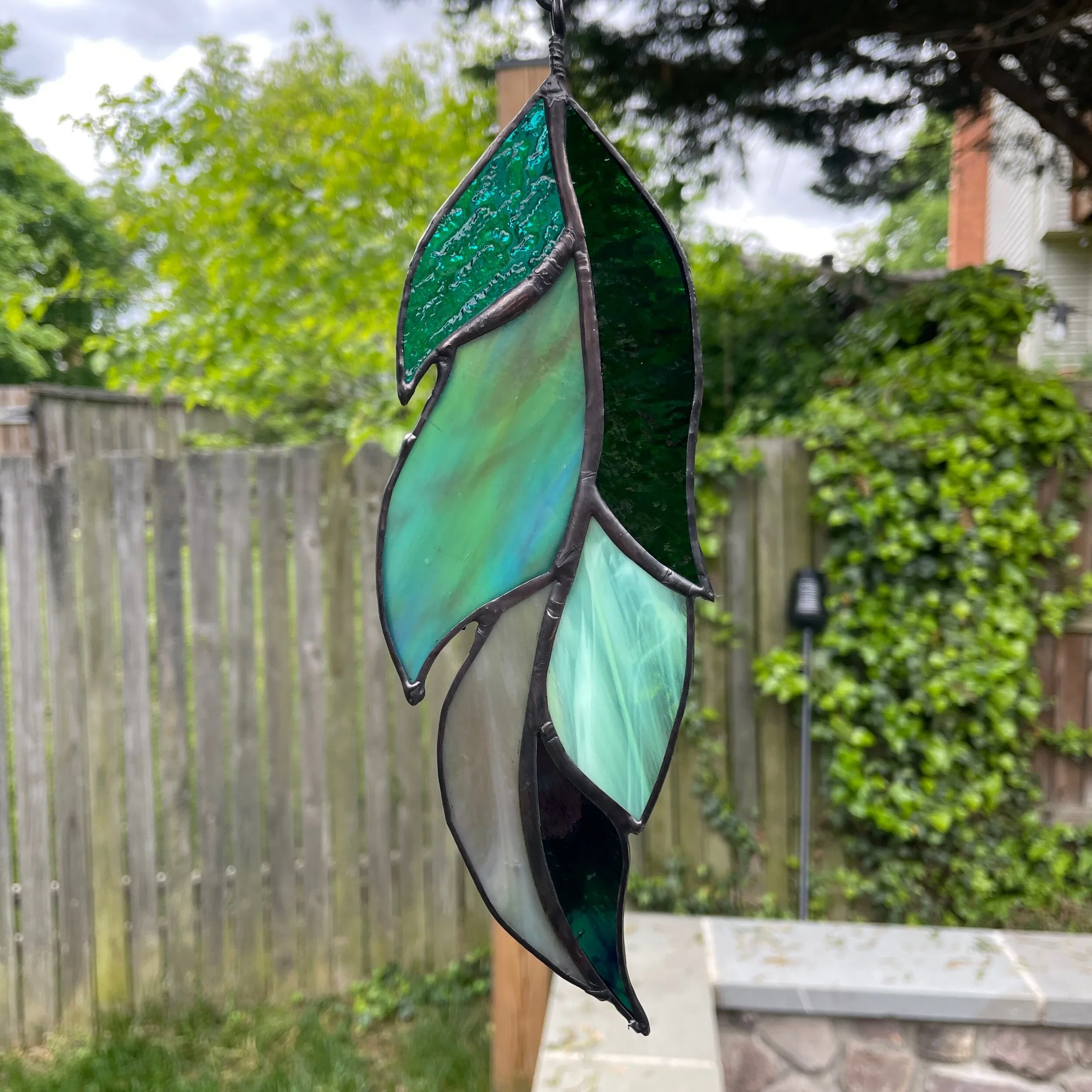 glass feather.webp