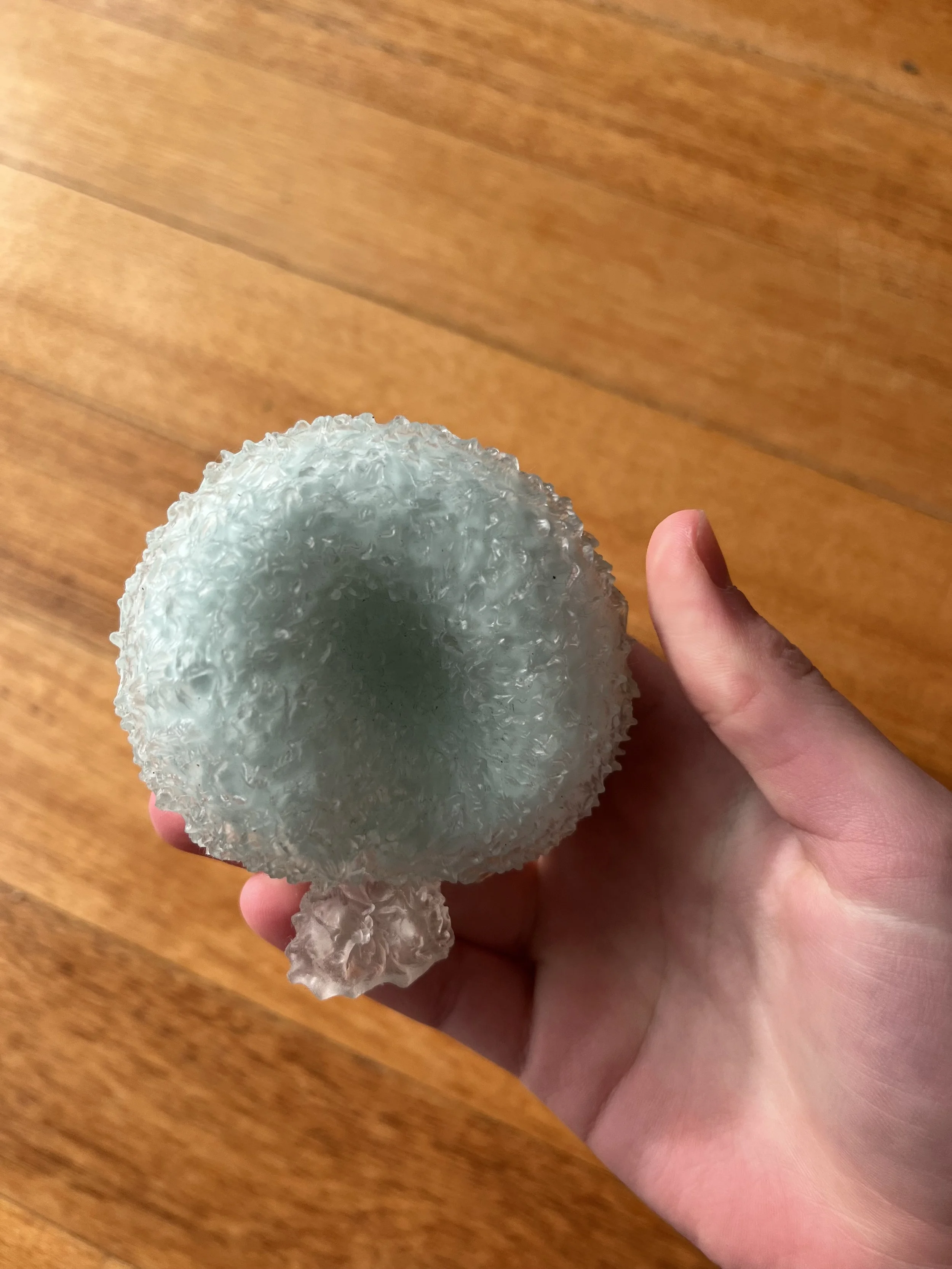 Close-up of a textured squishy ball.