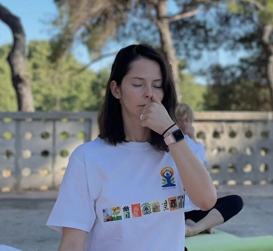 Julia teaching mindful movement and breathwork outdoors on Hvar Island