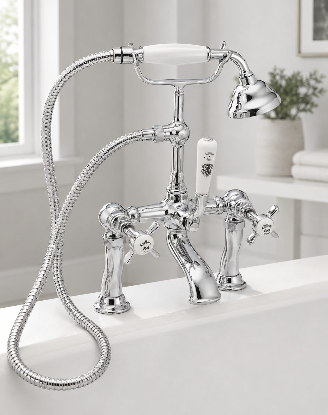 Silver vintage style faucet with handheld shower attached, set on a white bathtub in a bright, modern bathroom.