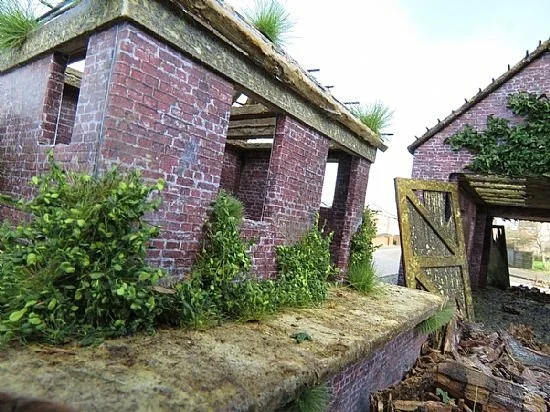 Image supplied by Allan Downes who makes extraordinary architectural models. He has used XL green tufts, Wild grass tufts and Leafy strips to provide a superb degree of realism to his derelict engine house model. Allan sells his models and many more 