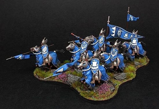 Beautifully painted and based set of Fantasy Knights (Knights of Dol Amroth from LOTR I think) by the painter "Brushstroke". He has used a nice selection of grass tuft types and Heather flower tufts to really enhance his excellent basing