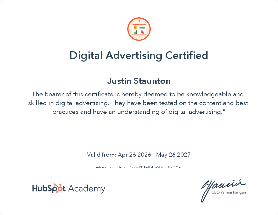 Digital Advertising Certified certificate issued to Justin Staunton by HubSpot Academy, signed by CEO Yamini Rangan, valid from April 26, 2026, to May 26, 2027.