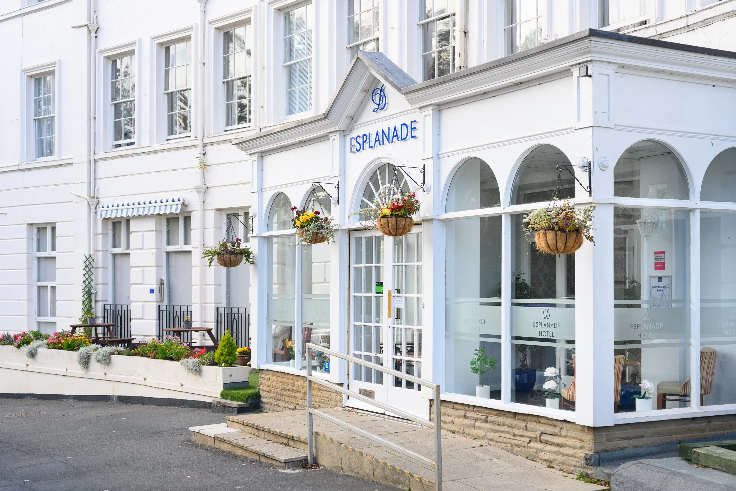 Main entrance of the Esplanade Hotel in Scarborough showing Victorian architecture and hotel reception entrance.